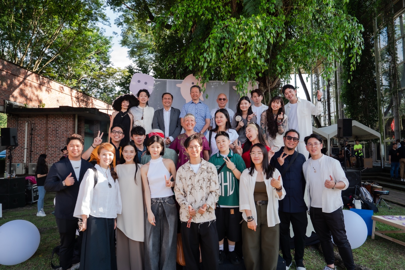 A group of people posing for a photo
AI-generated content may be incorrect.